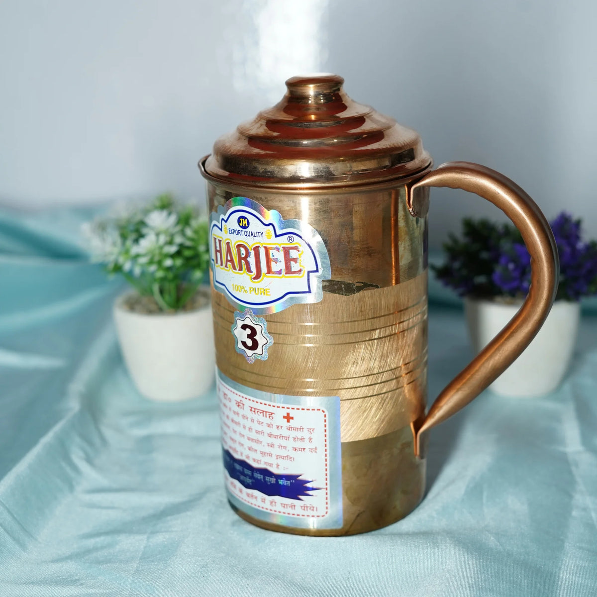 Side view of pure copper jug showing curved handle and lid, size No. 3