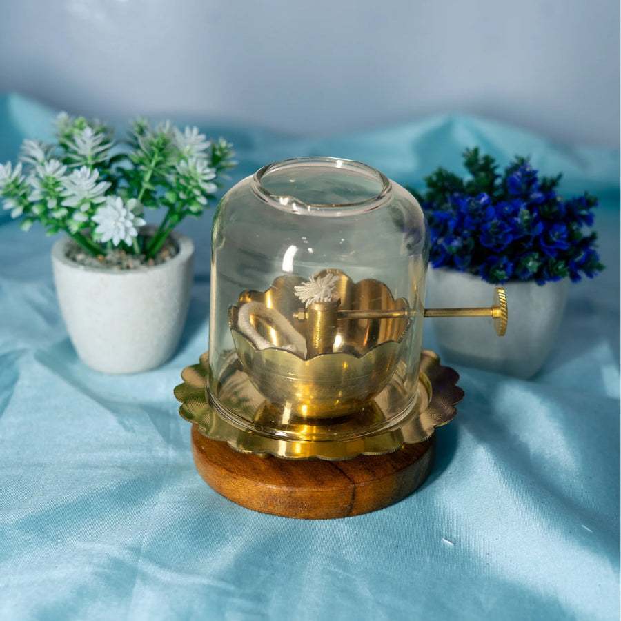 Brass Akhand Diya with lotus-petal brass tray, glass dome and bati adjusting screw