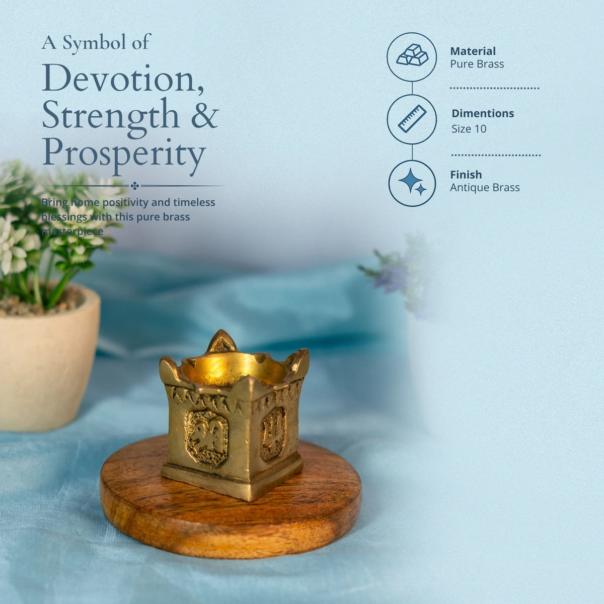 Brass tulsi diya on a wooden base with text that reads A Symbol of Devotion, Strength and Prosperity and material and finish details